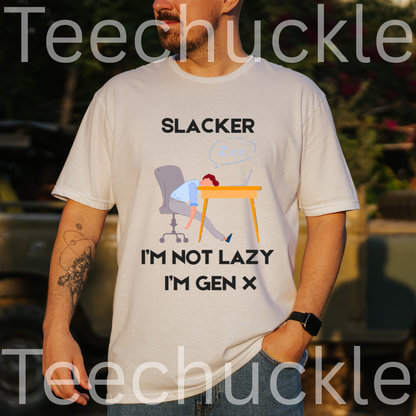 A man wearing a white graphic t-shirt with a 'Slacker I'm Not Lazy I'm Gen X' cartoon design, set against a blurred outdoor background 