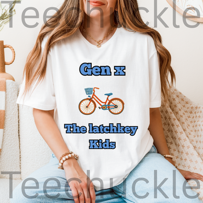 A woman wearing a white graphic t-shirt with the text 'Gen x The latchkey Kids' and an illustration of a bicycle. 