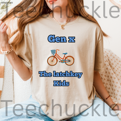 A woman wearing a sand graphic t-shirt with the text 'Gen x The latchkey Kids' and an illustration of an orange bicycle. 