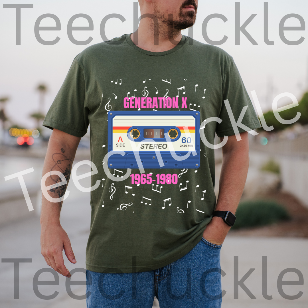 Man wearing a green t-shirt with a  80s style cassette tape design and pink text "GENERATION X 1965-1980" surrounded by music notes, standing on a street.