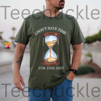 A man wearing a green graphic t-shirt with a printed hourglass design and the text 'I DON'T HAVE TIME FOR THIS SHIT'.
