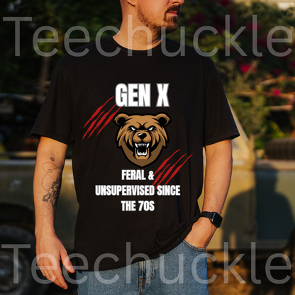 A man wearing a black graphic t-shirt with a bear design and the text 'GEN X FERAL & UNSUPERVISED SINCE THE 70S'. The background is an outdoor blurred setting with a vehicle and foliage.