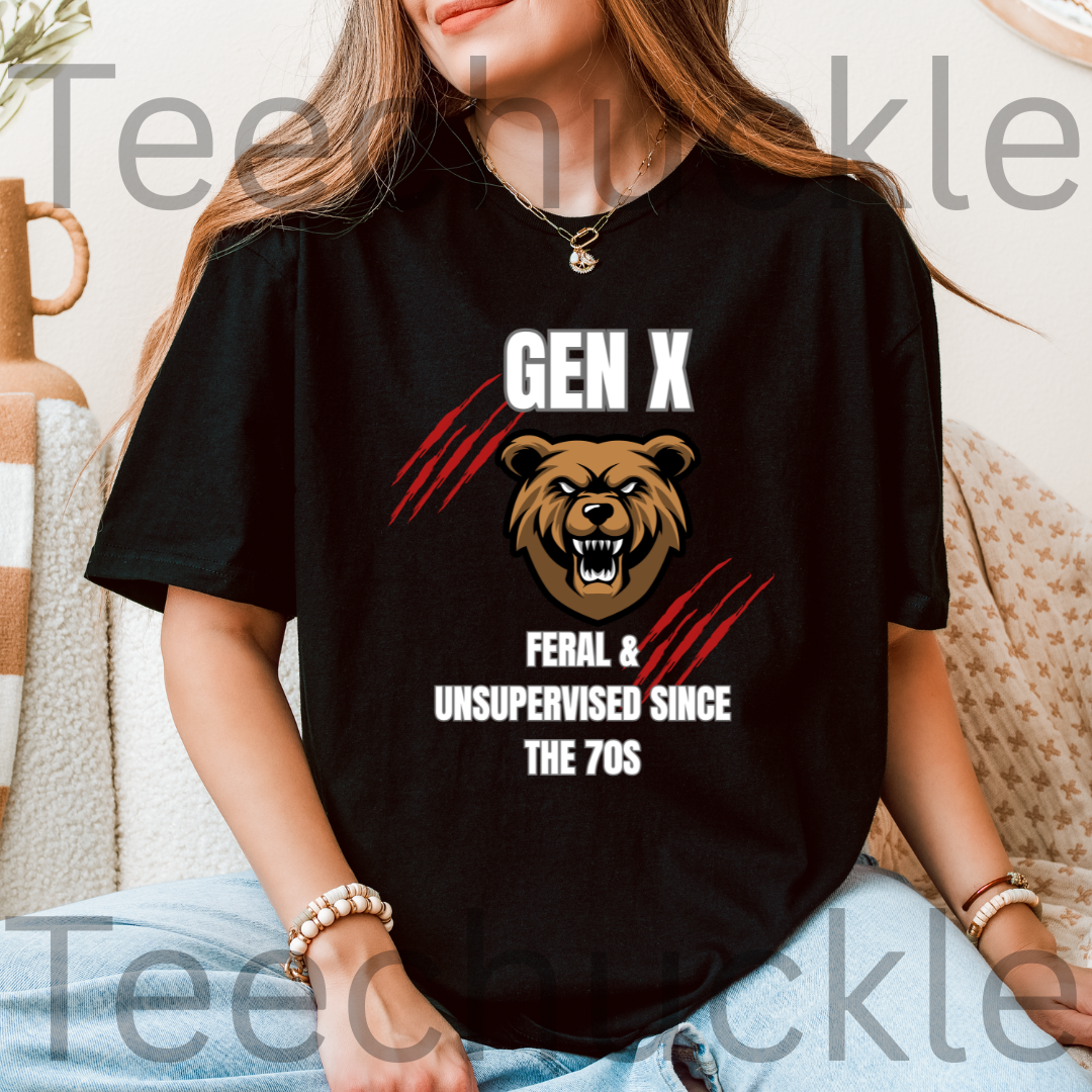 A woman wearing a black graphic t-shirt with a brown bear design and the text 'GEN X FERAL & UNSUPERVISED SINCE THE 70S'.