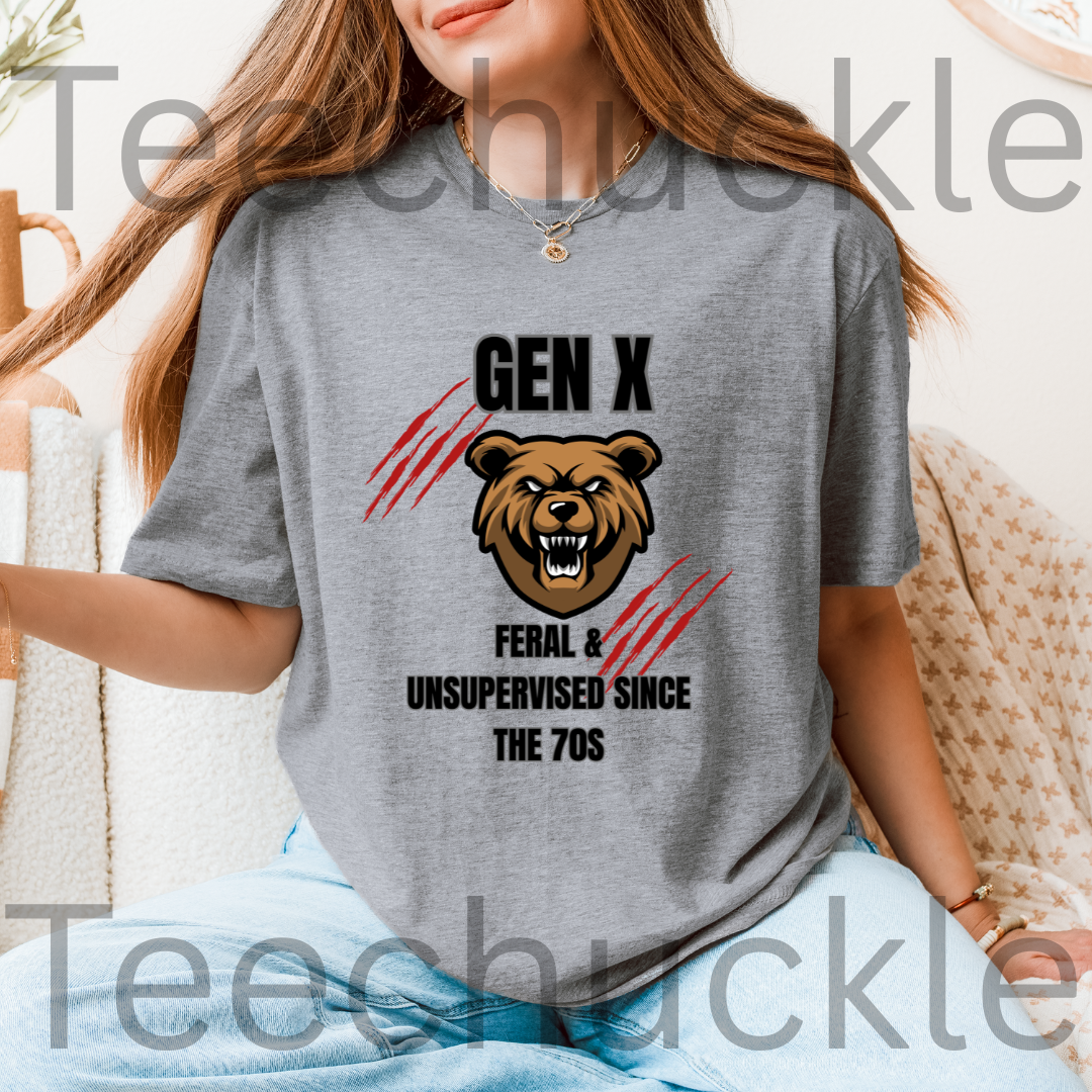 A woman wearing a gray graphic t-shirt with a brown bear design and the text 'GEN X FERAL & UNSUPERVISED SINCE THE 70S'.