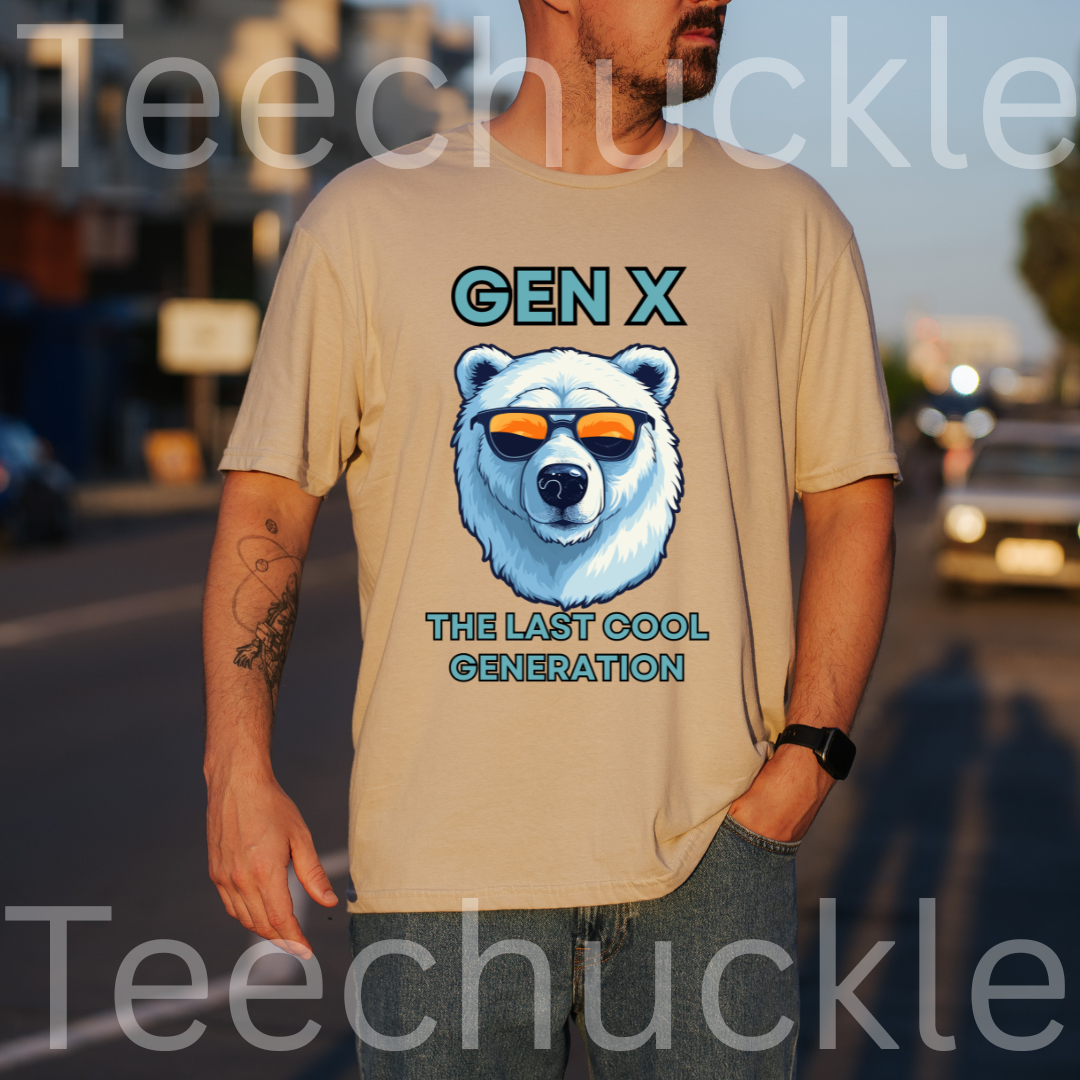 A man wearing a sand graphic t-shirt with a polar bear wearing sunglasses and the text 'GEN X THE LAST COOL GENERATION'. The background is a blurred street scene at sunset