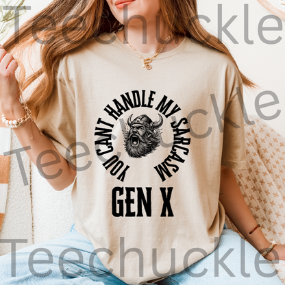 A woman wearing a sand graphic t-shirt with a black viking graphic and the text 'YOU CAN'T HANDLE MY SARCASM GEN X'. 