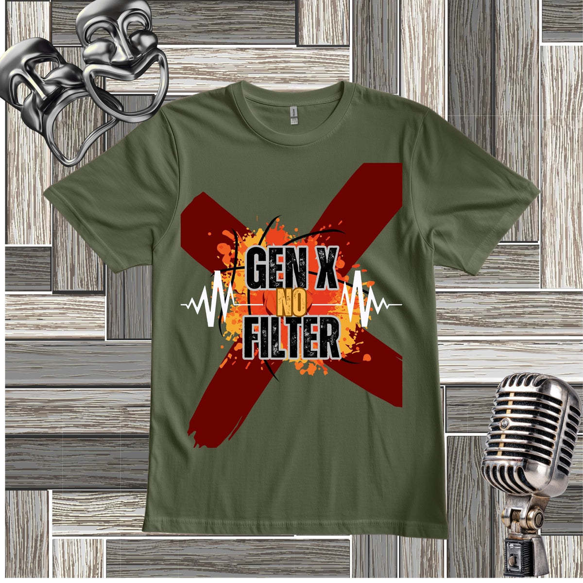 A green graphic t-shirt displayed flat against a rustic wood panel background, flanked by a silver theatrical mask on the top left and a vintage silver microphone on the bottom right. The t-shirt features a large red 'X' with 'GEN X NO FILTER' text.