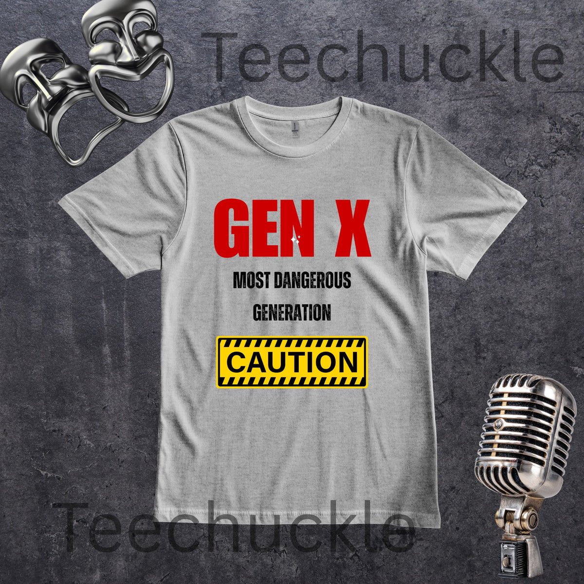 A gray crewneck t-shirt with a graphic print that reads 'GEN X MOST DANGEROUS GENERATION' in red and black, and a yellow 'CAUTION' sign. The t-shirt is displayed on a dark textured background with vintage-style silver props (a microphone and a pair of sunglasses) 