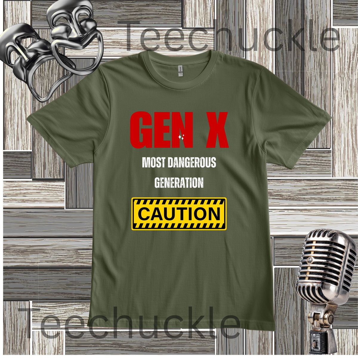 A green graphic t-shirt featuring the text 'GEN X MOST DANGEROUS GENERATION' in red and white, and a yellow 'CAUTION' sign graphic. The t-shirt is displayed on a gray wood panel background with vintage-style props, including a silver theatrical mask on the top left, a silver microphone on the bottom right