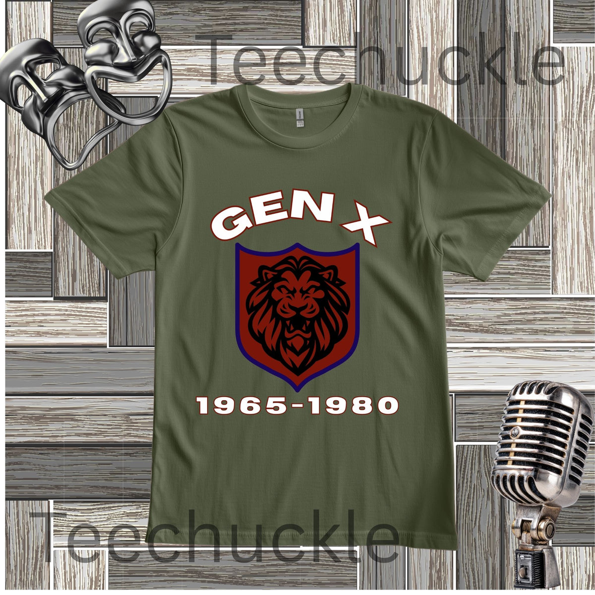 A green graphic t-shirt featuring a 'Gen X' theme with a lion crest and the years '1965-1980'. The t-shirt is displayed on a gray wood-paneled background with vintage props including a silver microphone and a metal mask