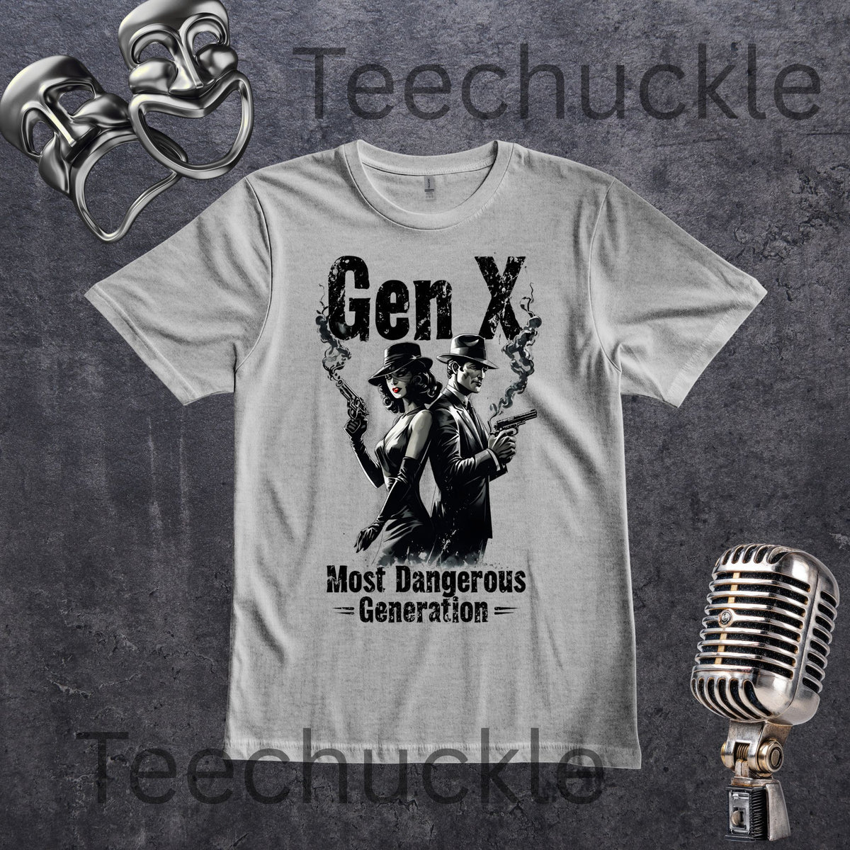 A light gray crewneck t-shirt featuring a black graphic of a man and a woman in vintage suits and top hats holding smoking guns, with the text 'Gen X' and 'Most Dangerous Generation'. The shirt is displayed on a textured dark gray background with vintage microphone and comedy masks props