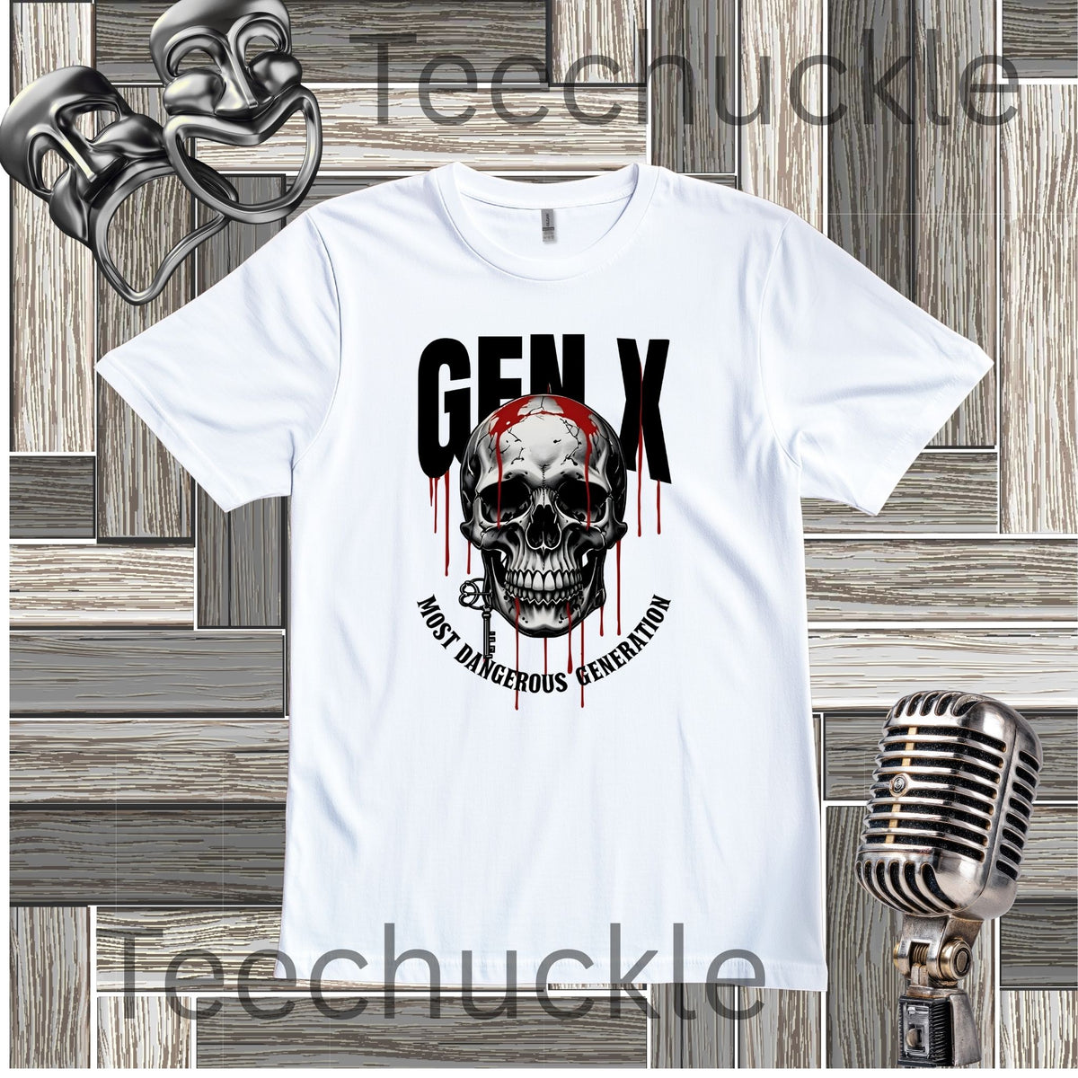 A white short-sleeve graphic T-shirt laid flat on a wood plank background, featuring a large skull and black text reading 'GEN X' with red dripping accents and the phrase 'MOST DANGEROUS GENERATION.' Decorative microphone and comedy masks props appear around the shirt.