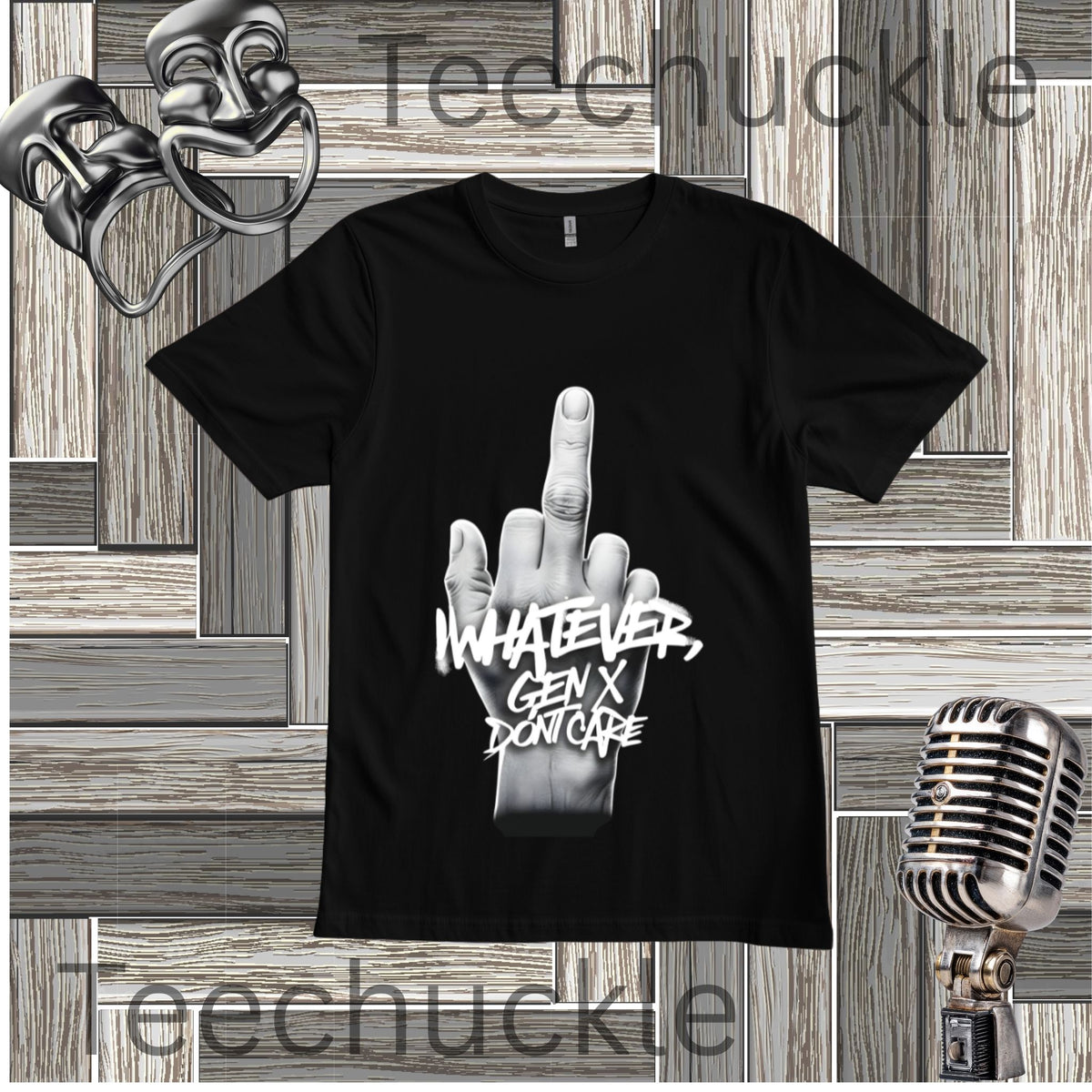 A black short-sleeve graphic t-shirt featuring a hand gesture and the text 'WHATEVER GEN X DON CARE' in white and gray. The t-shirt is displayed on a gray wood-paneled background with vintage-style props, including a silver comedy mask, a retro microphone