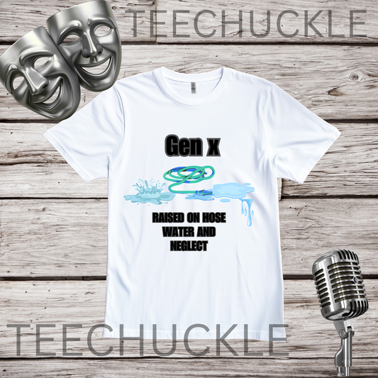 A white graphic t-shirt displayed on a rustic wooden background, featuring a design with a tangled blue hose, and the text 'Gen X RAISED ON HOSE WATER AND NEGLECT'.  and a vintage microphone and comedy masks props in background.