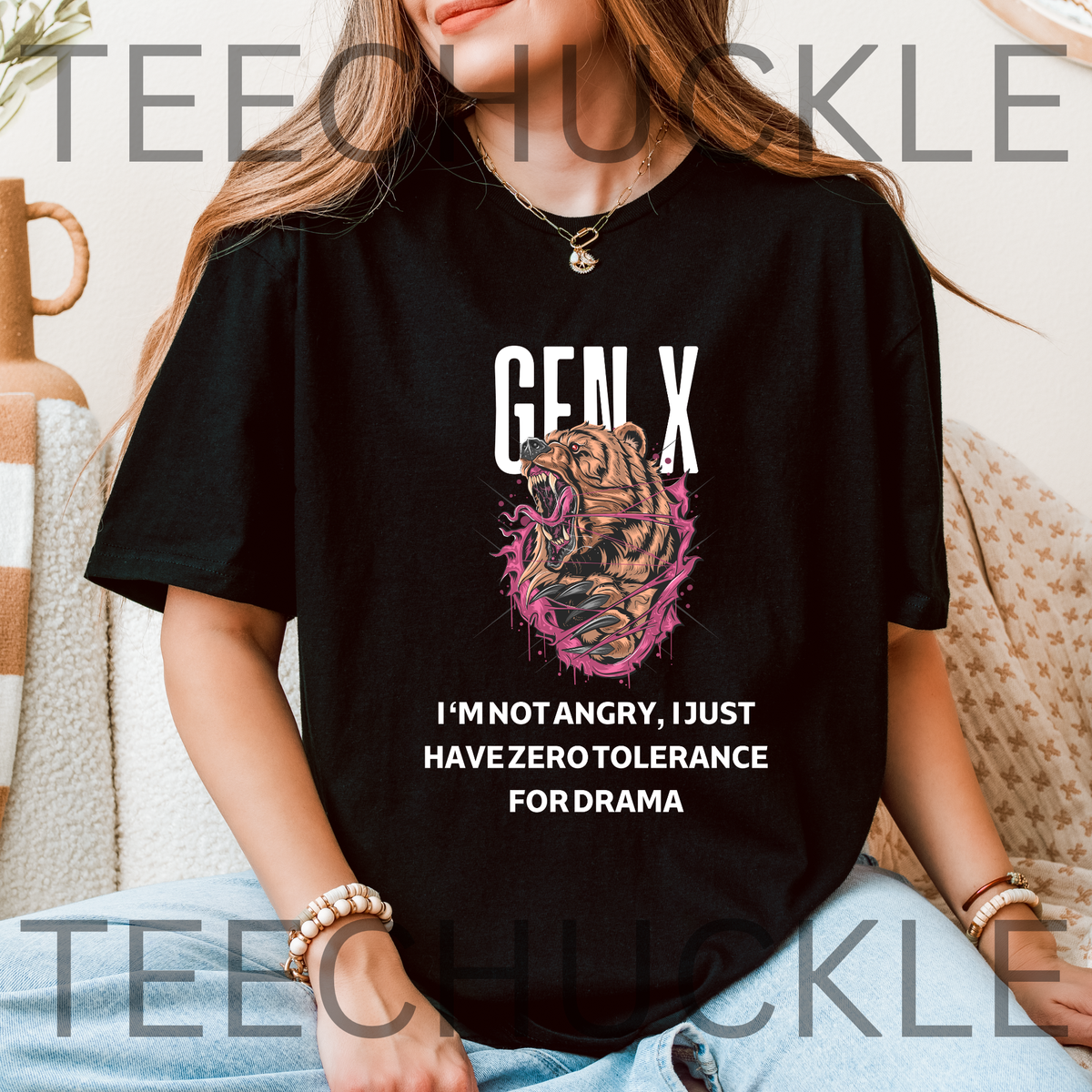 A woman wearing a black graphic t-shirt with a bear illustration and the text 'GEN X I'M NOT ANGRY, I JUST HAVE ZERO TOLERANCE FOR DRAMA'.