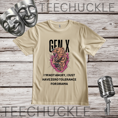 A sand graphic t-shirt displayed on a rustic wood background, featuring a roaring bear illustration and the text 'GEN X I'M NOT ANGRY, I JUST HAVE ZERO TOLERANCE FORDRAMA'. The shirt is styled with two silver theater masks, a vintage microphone