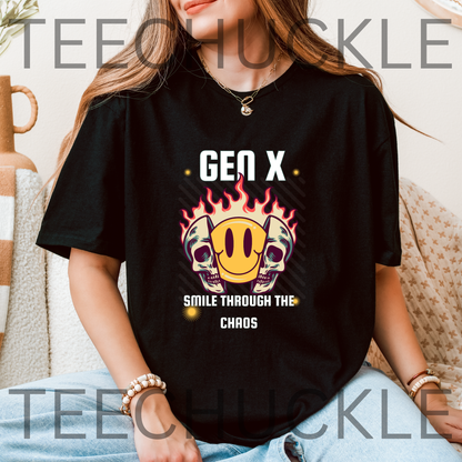A woman wearing a black graphic T-shirt with a 'Gen X Smile Through The Chaos' design featuring skulls, a smiley face, and flames. 