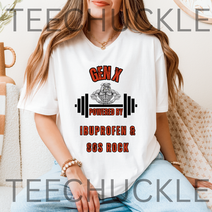 A woman sitting wearing a white graphic t-shirt. The shirt has a bulldog with a barbel graphic and the text 'GEN X POWERED BY IBUPROFEN & 80S ROCK'. 