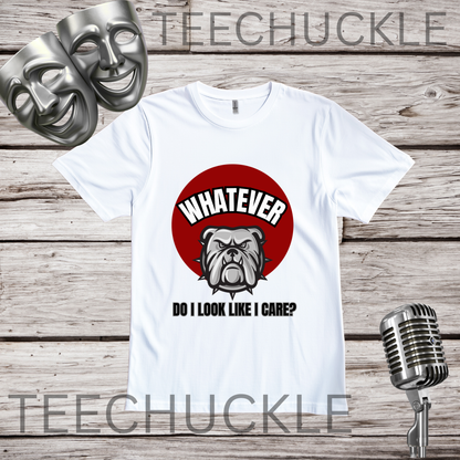 A white t-shirt on a wooden background with comedy masks and retro microphone in the corners. The shirt has a red circle with a bulldog on it and the text that reads " WHATEVER, DO I LOOK LIKE I CARE"