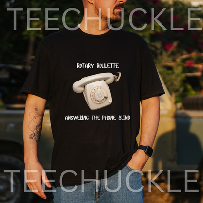 A man wearing a black graphic t-shirt with a white rotary phone illustration and the text 'ROTARY ROULETTE' and 'ANSWERING THE PHONE BLIND'.