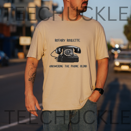 A man wearing a sand graphic t-shirt with a vintage rotary phone and the text 'ROTARY ROULETTE' and 'ANSWERING THE PHONE BLIND'.