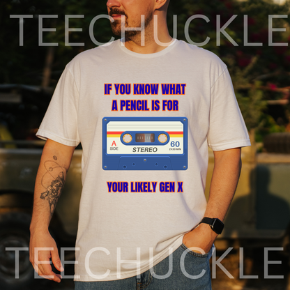 A man wearing a white graphic t-shirt with a blue and red cassette tape design and the text 'IF YOU KNOW WHAT A PENCIL IS FOR YOUR LIKELY GEN X'.
