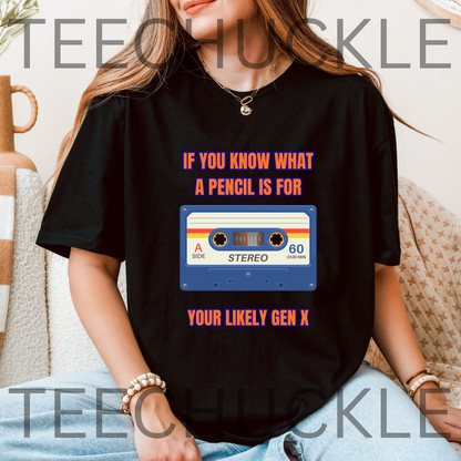 A woman wearing a black graphic T-shirt with a retro cassette tape design and the text 'IF YOU KNOW WHAT A PENCIL IS FOR YOUR LIKELY GEN X'. 
