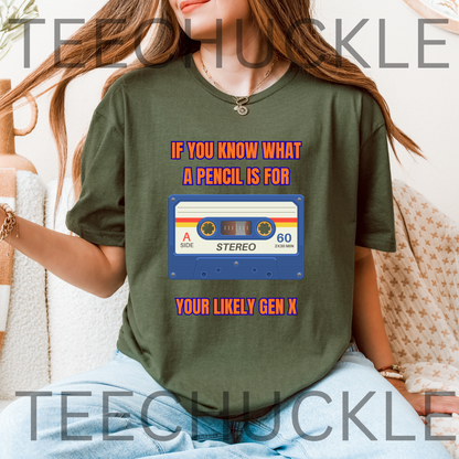 A woman wearing a green graphic t-shirt with a retro cassette tape design and the text 'IF YOU KNOW WHAT A PENCIL IS FOR YOUR LIKELY GEN X'.