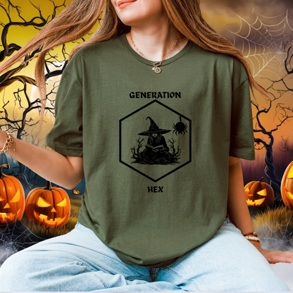 A woman wearing a green graphic t-shirt with a black witch-themed design that reads 'GENERATION HEX'. The background is a spooky Halloween scene with pumpkins, cobwebs, and bare trees.