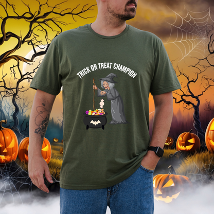 A man wearing a green graphic t-shirt with a 'Thick or Treat Champion' witch and cauldron design, set against a spooky Halloween background with pumpkins and cobwebs.