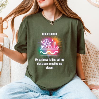 A woman wearing a green graphic t-shirt with a colorful 'Gen X Teacher' design, sitting on a cozy beige couch.