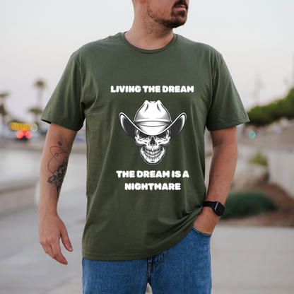 A man wearing a green graphic t-shirt with a white skull wearing a cowboy hat and the text 'LIVING THE DREAM THE DREAM IS A NIGHTMARE'.