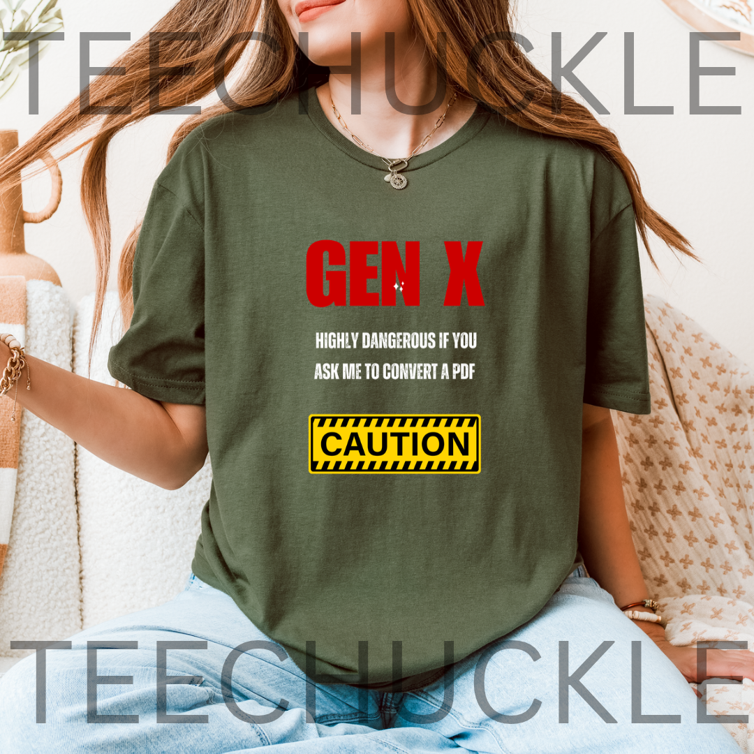 A woman wearing a green graphic t-shirt with a red and white 'GEN X' text design and a yellow caution sign graphic. The t-shirt features the text 'GEN X HIGHLY DANGEROUS IF YOU ASK ME TO CONVERT A PDF'.