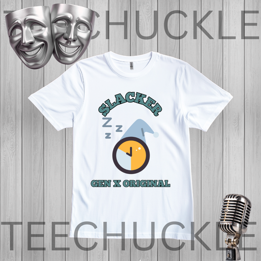 A white graphic t-shirt featuring a 'Slacker Gen X Original' design with a sleeping clock and 'Z' marks, displayed on a gray wood plank background with theatrical masks and a vintage microphone.