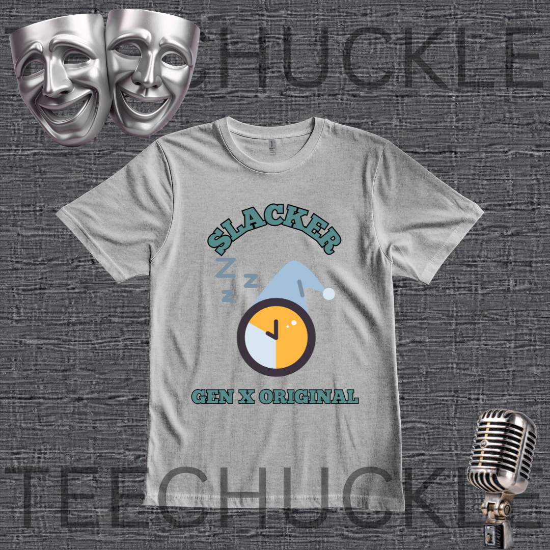 A  gray graphic t-shirt featuring a 'Slacker Gen X Original' design with a clock and sleeping zzz graphic, displayed on a dark gray textured background with theatrical masks and a vintage microphone.