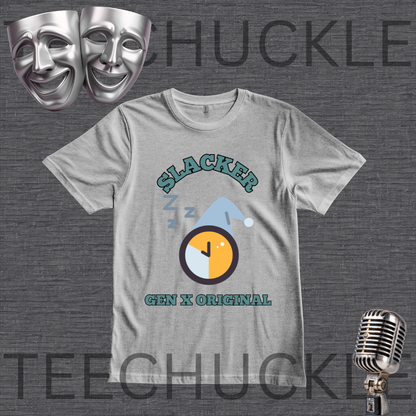 A  gray graphic t-shirt featuring a 'Slacker Gen X Original' design with a clock and sleeping zzz graphic, displayed on a dark gray textured background with theatrical masks and a vintage microphone.