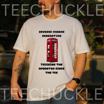 A man wearing a white graphic t-shirt with a red telephone booth print and black text reading 'REVERSE CHANGE GENERATION' and 'TRICKING THE OPERATOR SINCE THE 70S'. The background is a blurred outdoor setting, 