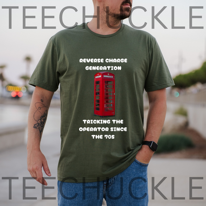 A man wearing a green graphic t-shirt with a red telephone booth and white text that reads 'EMERGENCY 10C COIN MY ENTIRE CHILDHOOD SAFETY NET'. The background is a blurred outdoor street scene,