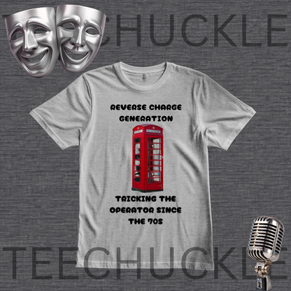 A gray graphic t-shirt featuring a red telephone booth illustration and the text 'REVERSE CHARGE GENERATION' and 'TRICKING THE OPERATOR SINCE THE 70S'. The t-shirt is displayed on a dark gray textured background with theatrical comedy masks in the top-left corner and a vintage microphone in the bottom-right corner.