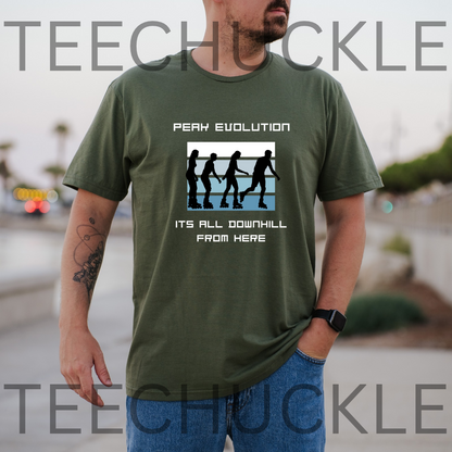 A man wearing a green graphic t-shirt with a 'Peak Evolution' downhill silhouette design and text, set against a blurred outdoor background