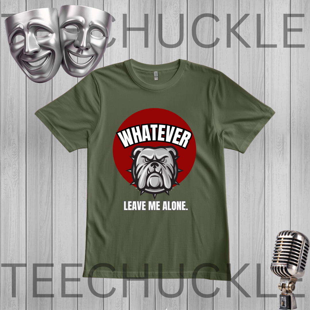 A green graphic t-shirt displayed on a gray wood-plank background. The shirt features a red circular graphic with a bulldog illustration and the text 'WHATEVER LEAVE ME ALONE'.