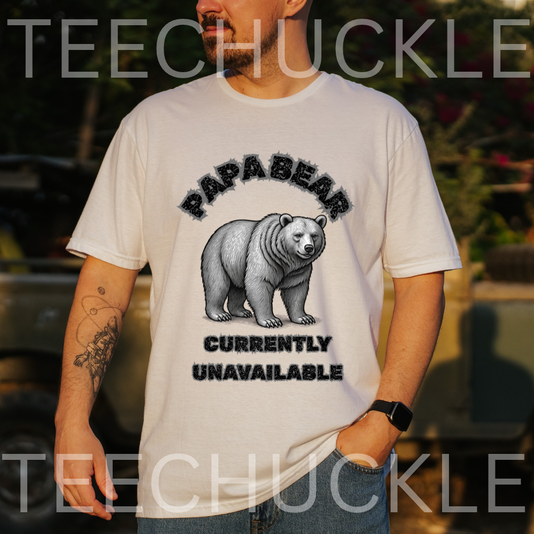 A man wearing a white graphic t-shirt with a black and gray bear design and the text 'PAPA BEAR CURRENTLY UNAVAILABLE'. 