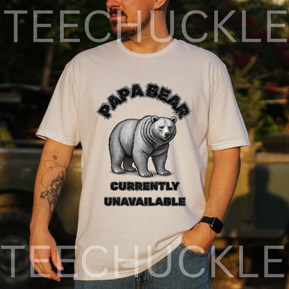 A man wearing a white graphic t-shirt with a black and gray bear design and the text 'PAPA BEAR CURRENTLY UNAVAILABLE'. 