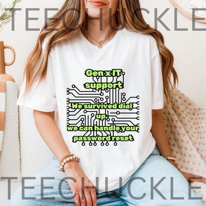 A woman wearing a white graphic t-shirt with a green and black 'Gen.x IT support We survived dial up we can handle your password reset' circuit board design, sitting on a couch.