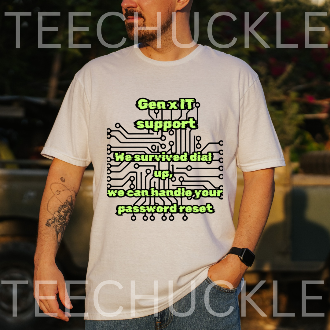 A man wearing a white graphic t-shirt with a green and black circuit board design and the text 'Gen.x IT support We survived dial up, we can handle your password reset'.