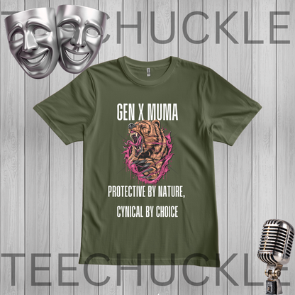 A green graphic t-shirt displayed on a gray wood plank background. The shirt features a graphic of a roaring bear in pink and orange tones, with white text reading 'GEN X MAMA BEAR' and 'PROTECTIVE BY NATURE, CYNICAL BY CHOICE'.