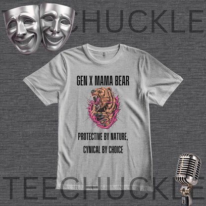 A gray graphic t-shirt displayed on a dark gray textured background, featuring a 'Gen X Mama Bear' design with a roaring bear illustration and text. The image includes decorative props like two silver theater masks in the top-left and a vintage silver microphone in the bottom-right