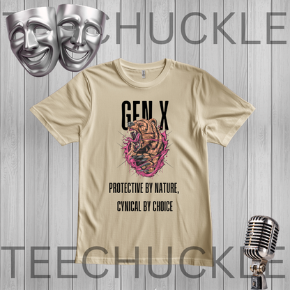A sand graphic t-shirt displayed on a gray wood-plank background, featuring a 'Gen X' bear illustration and the text 'Protective by nature, Cynical by choice'. The image includes decorative silver theater masks and a vintage microphone
